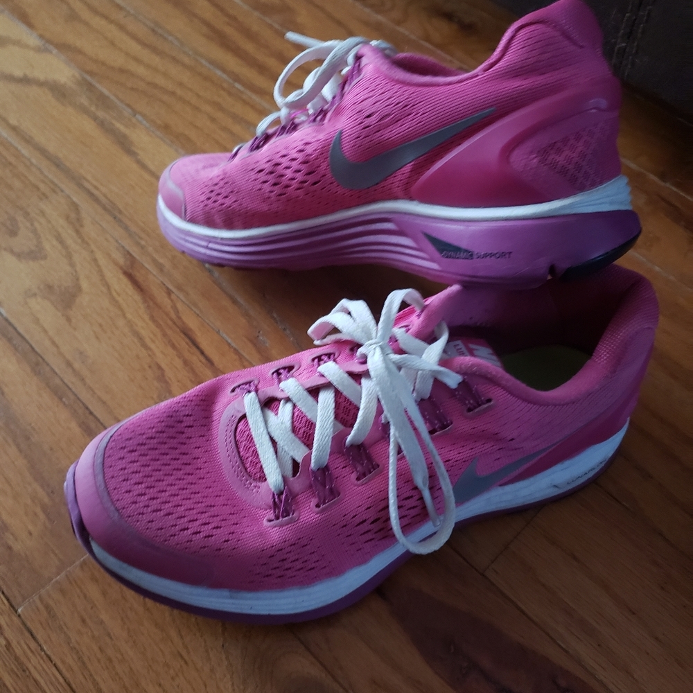 Nike tennis shoes, hot pink.